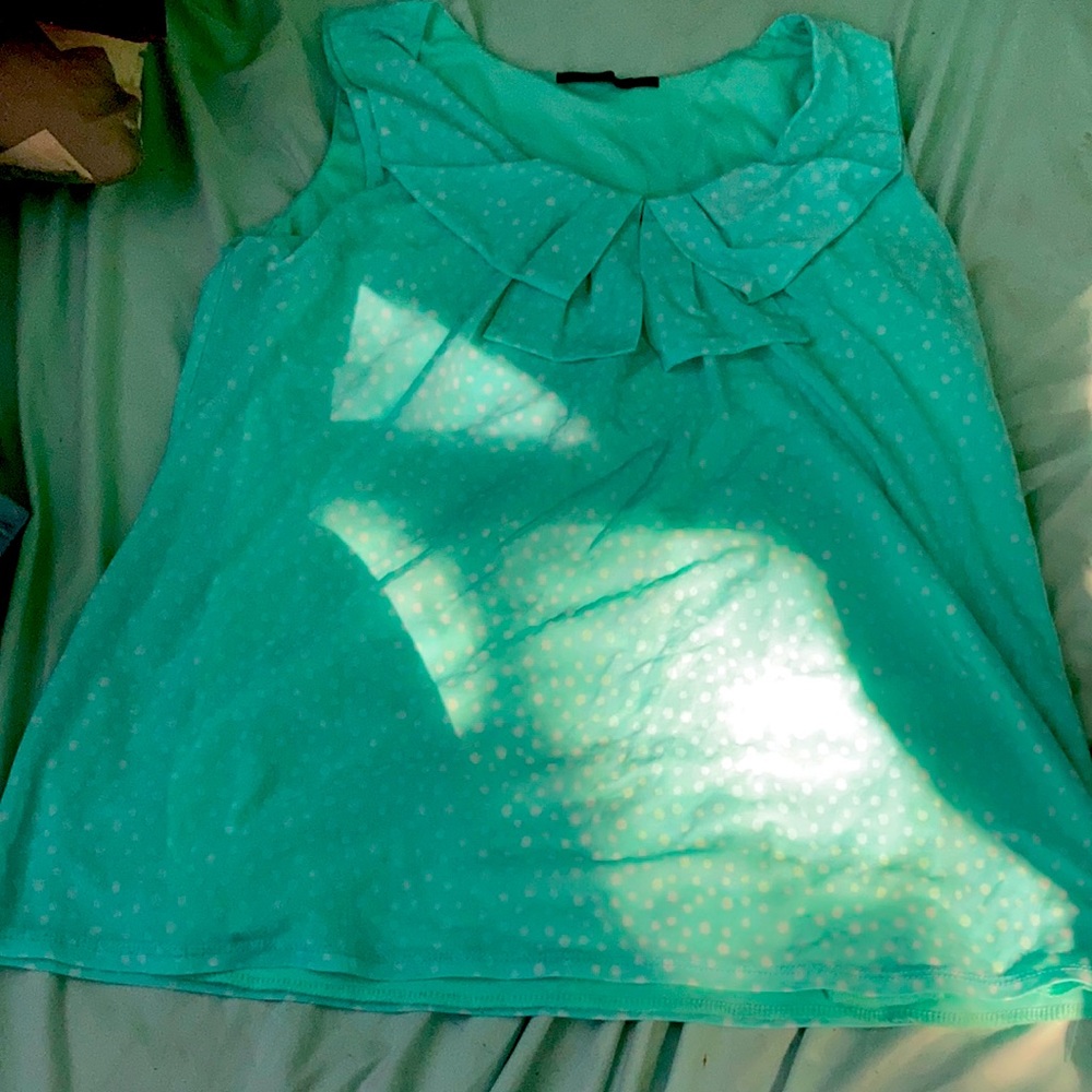 Blue top with white polkadots size large